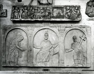 Lid of a sarcophagus depicting Adam and Eve, Daniel and Jonah; Christ Enthroned with St. Peter and St. Paul by Paleo Christian